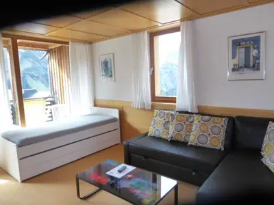 Ein Sitzbereich in der Unterkunft Widderstein Apartments