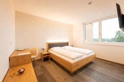 Ein Bett oder Betten in einem Zimmer der Unterkunft Motel Keckeis Inn - Self Check-in