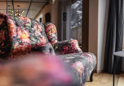 Ein Sitzbereich in der Unterkunft Burgi's - Adults only