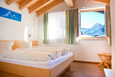 Ein Bett oder Betten in einem Zimmer der Unterkunft Hotel Garni Ragaz