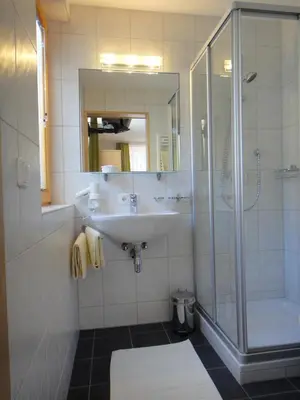 Ein Badezimmer in der Unterkunft Hotel Garni Ragaz