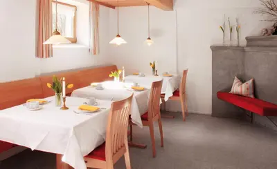Ein Sitzbereich in der Unterkunft Haus Arnika