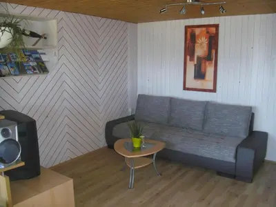 Ein Sitzbereich in der Unterkunft Ferienwohnung Lerch