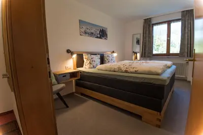 Ein Bett oder Betten in einem Zimmer der Unterkunft Haus Glasella