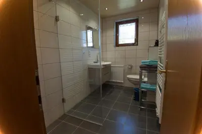 Ein Badezimmer in der Unterkunft Haus Glasella
