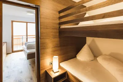 Ein Bett oder Betten in einem Zimmer der Unterkunft Landhaus Bergblicksuite TOP11