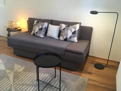 Ein Sitzbereich in der Unterkunft Wohnung in zentraler Lage im Rheintal