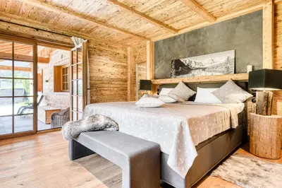 Ein Bett oder Betten in einem Zimmer der Unterkunft Chalet GM - Gesamtes Haus by A-Appartments
