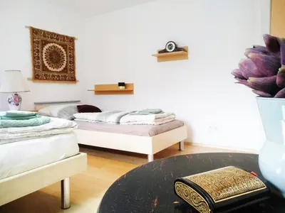 Ein Bett oder Betten in einem Zimmer der Unterkunft Dimai House No 16 Dornbirn Zentrum