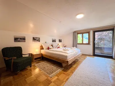 Ein Bett oder Betten in einem Zimmer der Unterkunft D`Alpenapartments Bezau