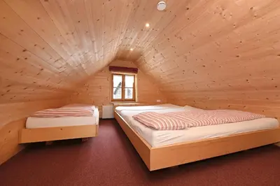 Ein Bett oder Betten in einem Zimmer der Unterkunft Der BiscHOF