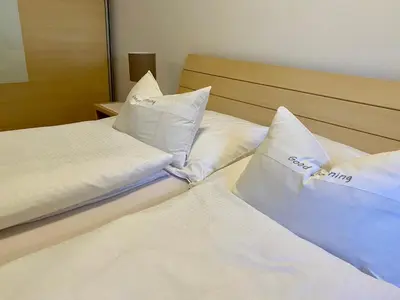 Ein Bett oder Betten in einem Zimmer der Unterkunft Ferienwohnungen Christine