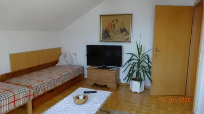 Ein Bett oder Betten in einem Zimmer der Unterkunft Ferienwohnung Schlemmer