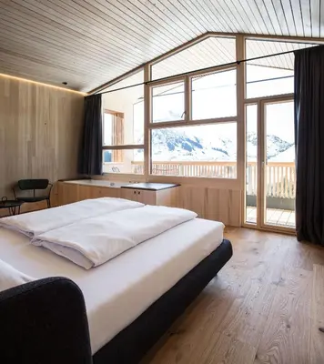 Ein Bett oder Betten in einem Zimmer der Unterkunft HOLZGAUER HAUS