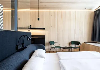 Ein Bett oder Betten in einem Zimmer der Unterkunft HOLZGAUER HAUS
