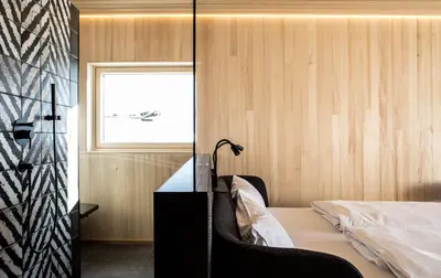 Ein Bett oder Betten in einem Zimmer der Unterkunft HOLZGAUER HAUS