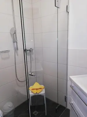 Ein Badezimmer in der Unterkunft Ferienwohnung Anton Künzler