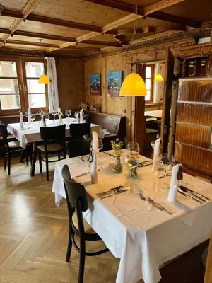 Ein Restaurant oder anderes Speiselokal in der Unterkunft Gasthaus Rössle