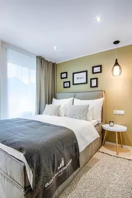 Ein Bett oder Betten in einem Zimmer der Unterkunft Business Hotel Maier