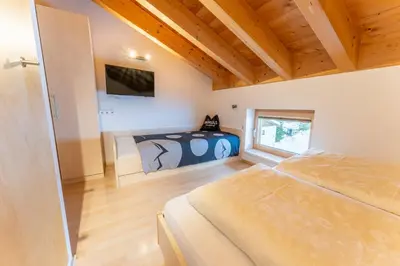 Ein Bett oder Betten in einem Zimmer der Unterkunft Haus Montana