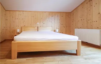 Ein Bett oder Betten in einem Zimmer der Unterkunft Moderne Ferienwohnungdalaas