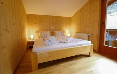 Ein Bett oder Betten in einem Zimmer der Unterkunft Ferienwohnung In Dalaas