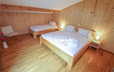 Ein Bett oder Betten in einem Zimmer der Unterkunft Ferienwohnung In Dalaas