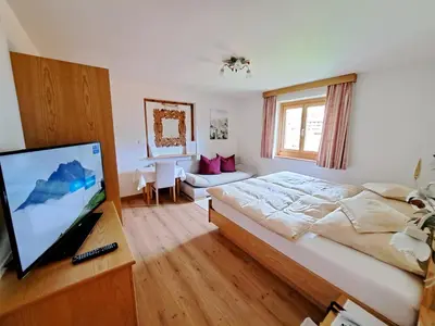 Ein Bett oder Betten in einem Zimmer der Unterkunft Pension Mallaun