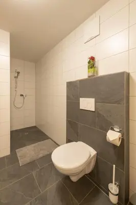 Ein Badezimmer in der Unterkunft Rosenhaus 1
