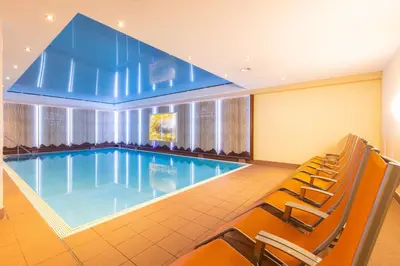 Der Swimmingpool an oder in der Nähe von IFA Alpenrose Hotel Kleinwalsertal