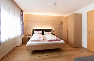 Ein Bett oder Betten in einem Zimmer der Unterkunft Gästehaus Manuela Puchmayr