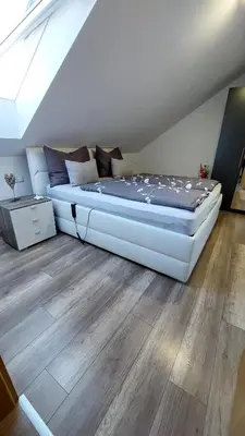 Ein Bett oder Betten in einem Zimmer der Unterkunft Living Apartment