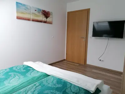 Ein Bett oder Betten in einem Zimmer der Unterkunft Living Apartment