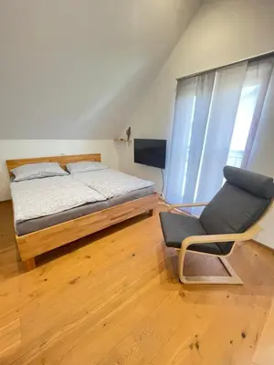 Ein Bett oder Betten in einem Zimmer der Unterkunft K10