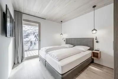 Ein Bett oder Betten in einem Zimmer der Unterkunft Alpenstern Panoramalodge