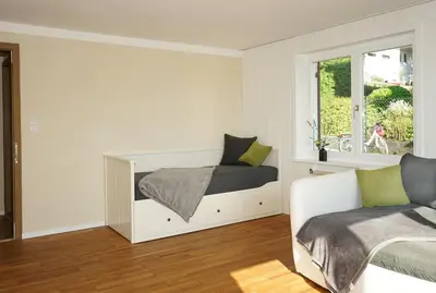 Ein Bett oder Betten in einem Zimmer der Unterkunft Haus Bregenz Apartment Bodensee