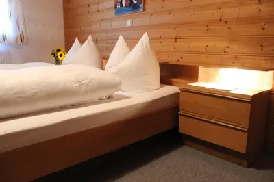 Ein Bett oder Betten in einem Zimmer der Unterkunft Haus Simma