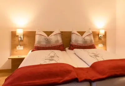 Ein Bett oder Betten in einem Zimmer der Unterkunft Haus Monika