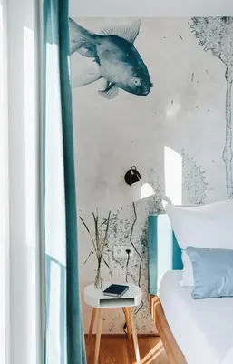 Ein Bett oder Betten in einem Zimmer der Unterkunft Rotes Haus Bregenz See Wohnung