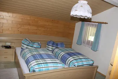Ein Bett oder Betten in einem Zimmer der Unterkunft Ferienwohnung Bickel