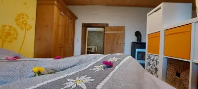Ein Bett oder Betten in einem Zimmer der Unterkunft Ferienwohnung Düns4