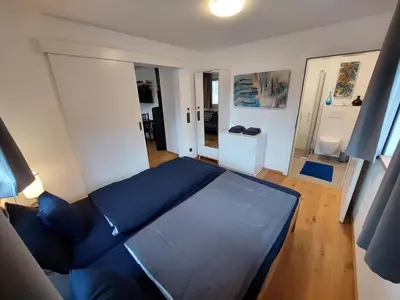 Ein Bett oder Betten in einem Zimmer der Unterkunft Haus Ströhle