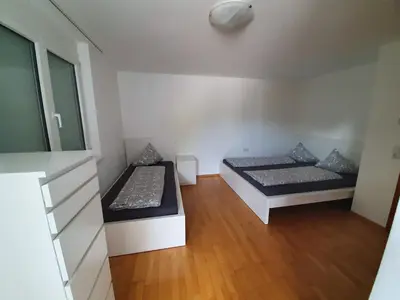 Ein Bett oder Betten in einem Zimmer der Unterkunft Ferienwohnung Anjele