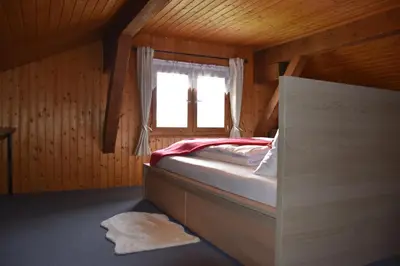 Ein Bett oder Betten in einem Zimmer der Unterkunft Ferienhaus Brittenberg