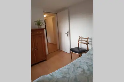 Ein Bett oder Betten in einem Zimmer der Unterkunft Ferienwohnung am Hatler Brunnen