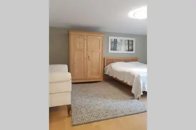 Ein Bett oder Betten in einem Zimmer der Unterkunft Ferienwohnung am Hatler Brunnen