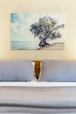 Ein Bett oder Betten in einem Zimmer der Unterkunft Bregenzer Traum am Bodensee inkl Fahrräder