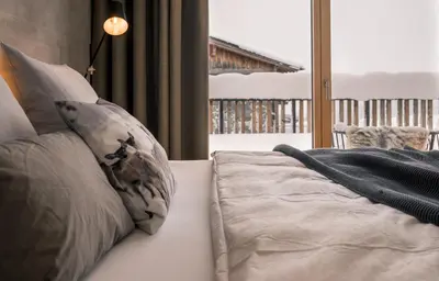 Ein Bett oder Betten in einem Zimmer der Unterkunft OBERLECH750. Refugium am Berg.