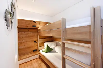 Ein Bett oder Betten in einem Zimmer der Unterkunft Ferienwohnung Saxenhammer
