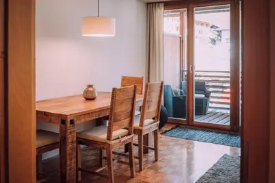 Ein Sitzbereich in der Unterkunft Apartment Auenfeld Widderstein